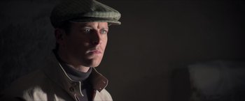 Movie still from “The Man from U.N.C.L.E.” (2015), directed by Guy Ritchie – A person wearing a hat; Close Up shot, Low angle