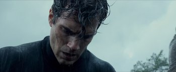 Movie still from “The Man from U.N.C.L.E.” (2015), directed by Guy Ritchie – A person with wet hair; Close Up shot, Over the shoulder angle