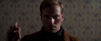 Movie still from “The Man from U.N.C.L.E.” (2015), directed by Guy Ritchie – A person with a bruise on his face; Close Up shot, Low angle