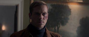 Movie still from “The Man from U.N.C.L.E.” (2015), directed by Guy Ritchie – A person with a bruise on his face; Close Up shot, Low angle
