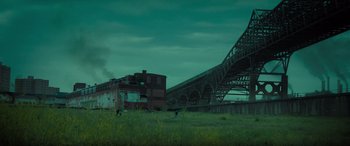 Movie still from “The Many Saints of Newark” (2021), directed by Alan Taylor – An old train is going down the tracks; Extreme Wide shot, Low angle