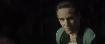 Movie still from “The Many Saints of Newark” (2021), directed by Alan Taylor – A person wearing a jacket; Close Up shot, Low angle