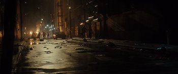 Movie still from “The Many Saints of Newark” (2021), directed by Alan Taylor – An empty street at night in the dark; Extreme Wide shot, High angle