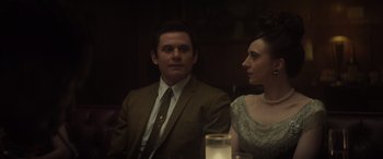 Movie still from “The Many Saints of Newark” (2021), directed by Alan Taylor – A man and a woman sitting at a dinner table; Close Up shot, Over the shoulder angle