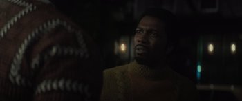 Movie still from “The Many Saints of Newark” (2021), directed by Alan Taylor – A person wearing a sweater; Close Up shot, Over the shoulder angle