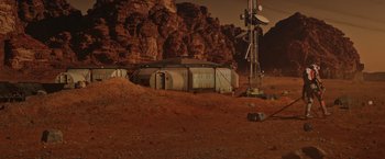 Movie still from “The Martian” (2015), directed by Ridley Scott – An abandoned building in the middle of the desert; Extreme Wide shot, High angle