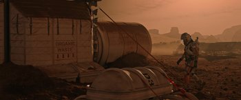 Movie still from “The Martian” (2015), directed by Ridley Scott – A train is traveling down the tracks in the desert; Extreme Wide shot, High angle