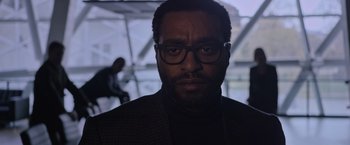 Movie still from “The Martian” (2015), directed by Ridley Scott – A person wearing glasses and a jacket; Close Up shot, Low angle