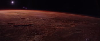Movie still from “The Martian” (2015), directed by Ridley Scott – A view of the earth taken from a space station; Extreme Wide shot, Overhead angle