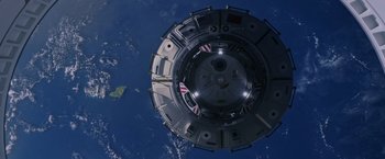 Movie still from “The Martian” (2015), directed by Ridley Scott – An aerial view of a space station in the ocean; Extreme Wide shot, Overhead angle
