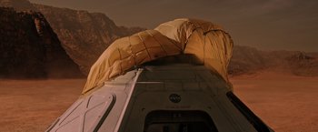 Movie still from “The Martian” (2015), directed by Ridley Scott – An image of a space ship in the desert; Extreme Wide shot, Overhead angle