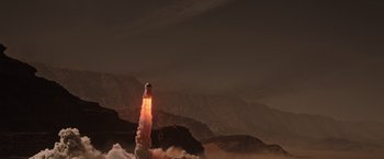 Movie still from “The Martian” (2015), directed by Ridley Scott – An image of a rocket being launched into the night sky; Extreme Wide shot, Low angle