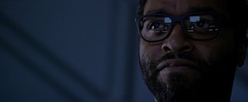 Movie still from “The Martian” (2015), directed by Ridley Scott – A person wearing glasses; Close Up shot, Low angle