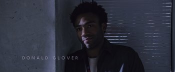 Movie still from “The Martian” (2015), directed by Ridley Scott – A person wearing a jacket; Close Up shot, Over the shoulder angle