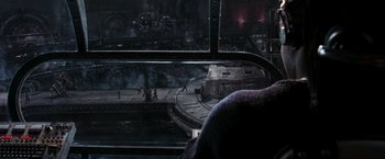 Movie still from “The Matrix Reloaded” (2003), directed by Lana Wachowski – A view of a city from a train window; Extreme Wide shot, High angle