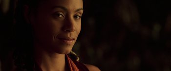 Movie still from “The Matrix Reloaded” (2003), directed by Lana Wachowski – A woman's face in the dark; Close Up shot, Over the shoulder angle