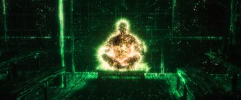 Movie still from “The Matrix Reloaded” (2003), directed by Lana Wachowski – A man sitting in the shape of a lotus flower; Extreme Wide shot, High angle