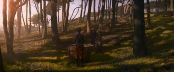 Movie still from “The Matrix Resurrections” (2021), directed by Lana Wachowski – A painting of people standing in the woods; Extreme Wide shot, Over the shoulder angle