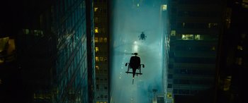 Movie still from “The Matrix Resurrections” (2021), directed by Lana Wachowski – A helicopter is flying through the air at night; Extreme Wide shot, High angle