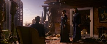 Movie still from “The Matrix Resurrections” (2021), directed by Lana Wachowski – A group of people standing in a room; Wide shot, Low angle