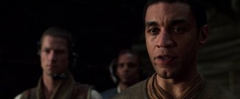 Movie still from “The Matrix Revolutions” (2003), directed by Lilly Wachowski – A person with a face covered in blood; Close Up shot, Low angle