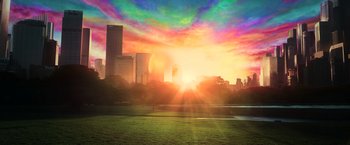 Movie still from “The Matrix Revolutions” (2003), directed by Lilly Wachowski – The sun is setting over a large city; Extreme Wide shot, High angle