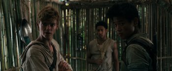 Movie still from “The Maze Runner” (2014), directed by Wes Ball – A group of young men standing next to each other; Close Up shot, Over the shoulder angle