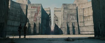 Movie still from “The Maze Runner” (2014), directed by Wes Ball – An image of an empty street with a lot of buildings in the background; Extreme Wide shot, High angle