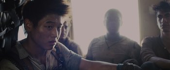 Movie still from “The Maze Runner” (2014), directed by Wes Ball – A group of young people standing next to each other in a room; Close Up shot, Over the shoulder angle