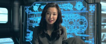 Movie still from “The Meg” (2018), directed by Jon Turteltaub – A woman in front of a computer screen; Close Up shot, Over the shoulder angle