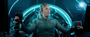 Movie still from “The Meg” (2018), directed by Jon Turteltaub – A woman standing in front of a spaceship; Medium shot, Over the shoulder angle