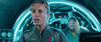 Movie still from “The Meg” (2018), directed by Jon Turteltaub – A woman and a man are standing in a spaceship; Close Up shot, Over the shoulder angle