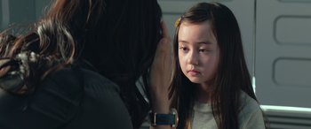 Movie still from “The Meg” (2018), directed by Jon Turteltaub – A little girl looking at her mother in the mirror; Close Up shot, Over the shoulder angle