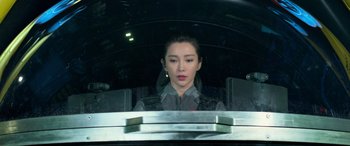 Movie still from “The Meg” (2018), directed by Jon Turteltaub – A woman sitting in the back seat of a car; Close Up shot, Over the shoulder angle