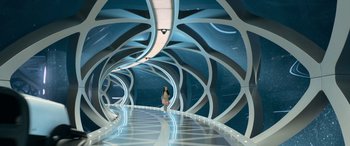 Movie still from “The Meg” (2018), directed by Jon Turteltaub – A woman is walking in a futuristic tunnel; Wide shot, High angle