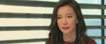 Movie still from “The Meg” (2018), directed by Jon Turteltaub – A person with long hair; Close Up shot, Over the shoulder angle