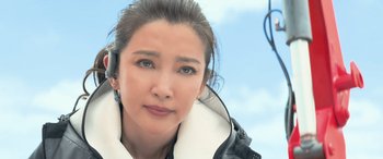 Movie still from “The Meg” (2018), directed by Jon Turteltaub – A person wearing a jacket; Close Up shot, Low angle