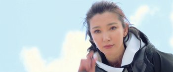 Movie still from “The Meg” (2018), directed by Jon Turteltaub – A person wearing a headset; Close Up shot, Low angle