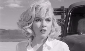 Movie still from “The Misfits” (1961), directed by John Huston – A black - and - white photo of a woman with blonde hair; Close Up shot, Low angle