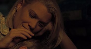 Movie still from “The Mist” (2007), directed by Frank Darabont – A person laying on the ground; Close Up shot, High angle