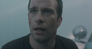 Movie still from “The Mist” (2007), directed by Frank Darabont – A person with blood on his face; Close Up shot, Low angle