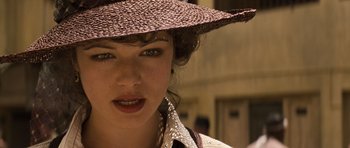 Movie still from “The Mummy” (1999), directed by Stephen Sommers – A person wearing a hat; Close Up shot, Over the shoulder angle