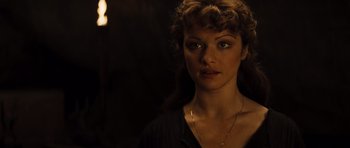 Movie still from “The Mummy” (1999), directed by Stephen Sommers – A person wearing a black shirt; Close Up shot, Over the shoulder angle