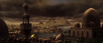 Movie still from “The Mummy” (1999), directed by Stephen Sommers – An image of a painting of the pyramids of gizeh; Extreme Wide shot, High angle