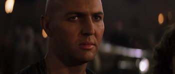 Movie still from “The Mummy” (1999), directed by Stephen Sommers – A man's face in a dimly - lit room; Close Up shot, Low angle