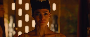 Movie still from “The Mummy” (2017), directed by Alex Kurtzman – A person wearing a dress; Close Up shot, Over the shoulder angle