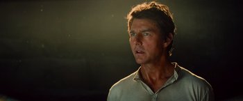 Movie still from “The Mummy” (2017), directed by Alex Kurtzman – A man in a white shirt is looking to his left; Close Up shot, Over the shoulder angle