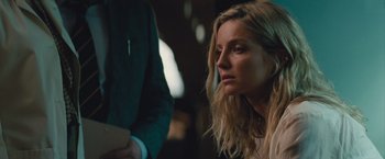 Movie still from “The Mummy” (2017), directed by Alex Kurtzman – A person holding a cell phone; Close Up shot, Over the shoulder angle