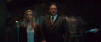 Movie still from “The Mummy” (2017), directed by Alex Kurtzman – A man and a woman standing next to each other; Medium shot, Low angle