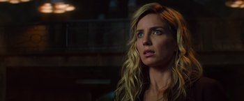 Movie still from “The Mummy” (2017), directed by Alex Kurtzman – A woman with long blonde hair stares into the distance; Close Up shot, Over the shoulder angle
